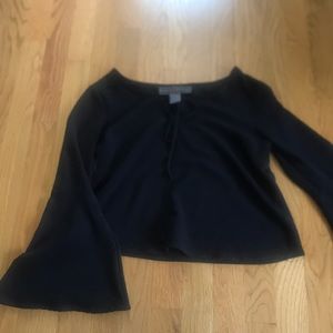 Cropped black long sleeve shirt with bell sleeves